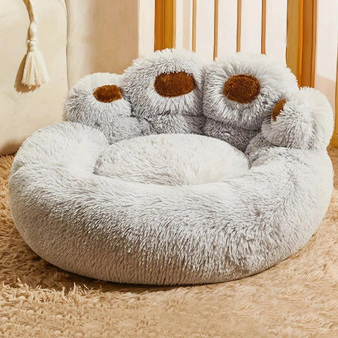 lit pour chien gris en forme de patte 